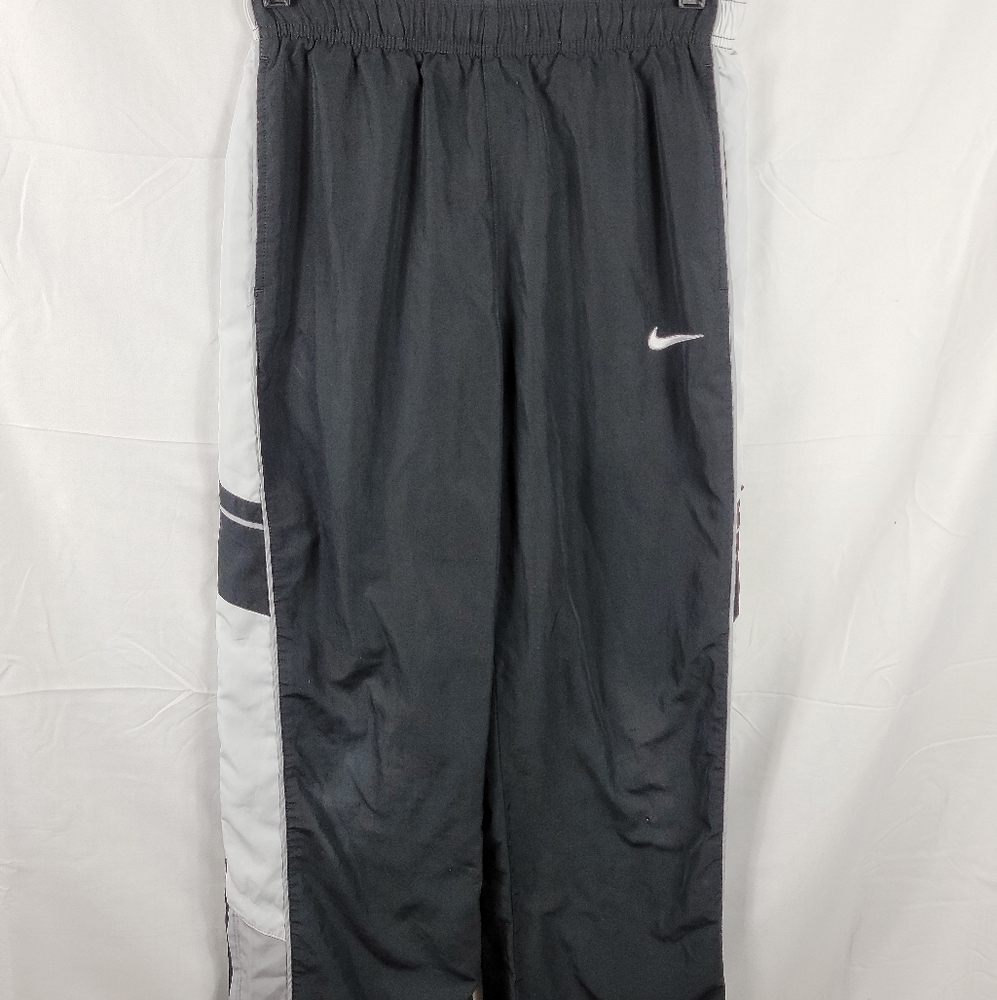 Nike Boys track pants Size L.
